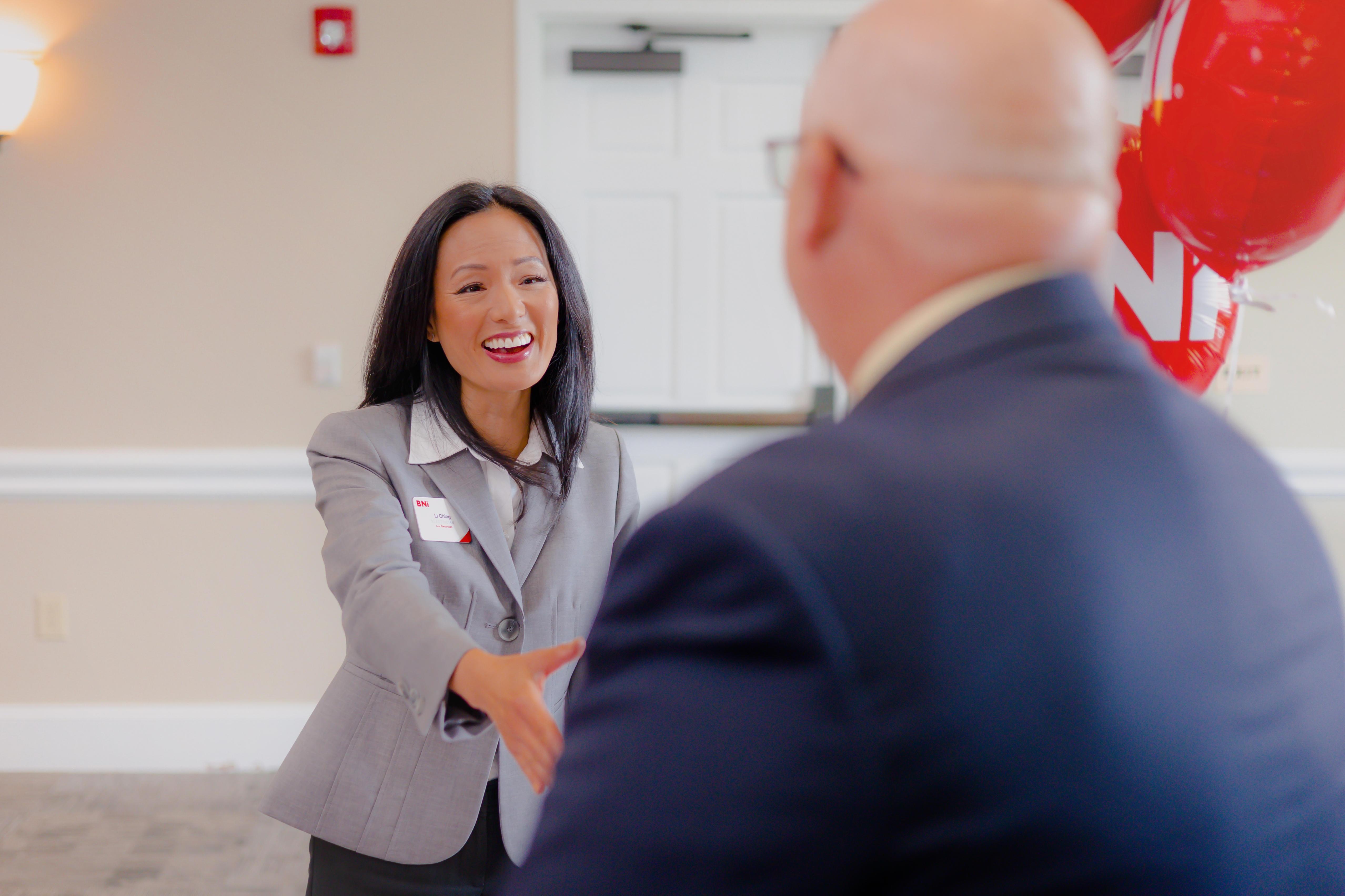 Business professionals building relationships at a networking event.